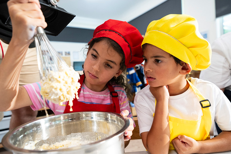 Children cooking in the Imagine Kitchen Academy