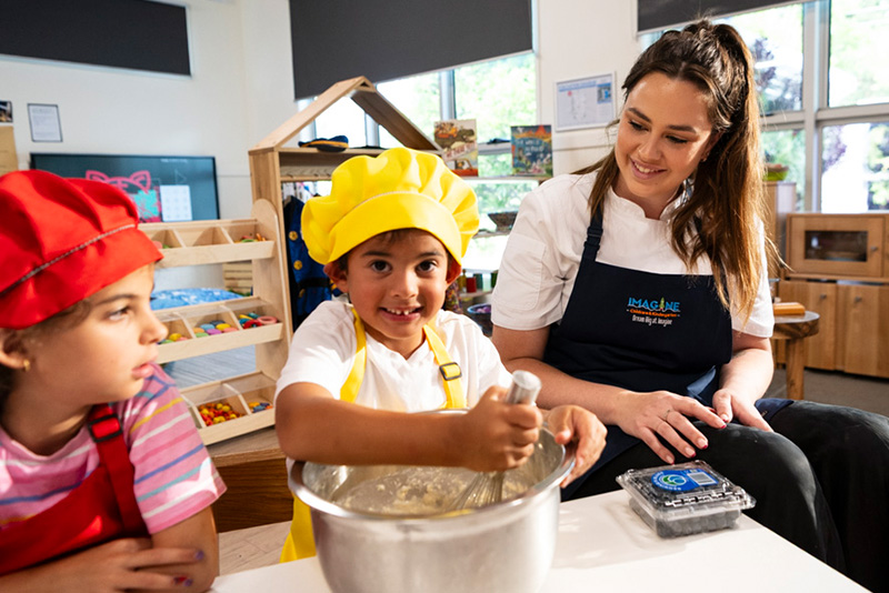 Children cooking in the Imagine Kitchen Academy