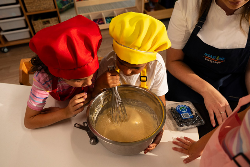 Children cooking in the Imagine Kitchen Academy